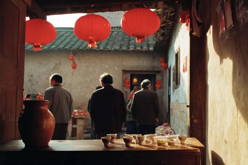 Hakka rice wine on a table in a round earthen house before Chinese New Year